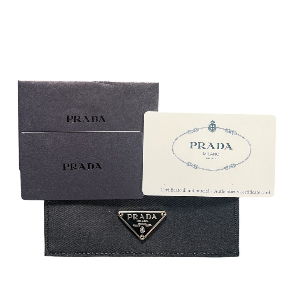 Authentic PRADA Nylon Bifold TESSUTO NERO
Saffiano Leather Black Wallet - Picture 9 of 10